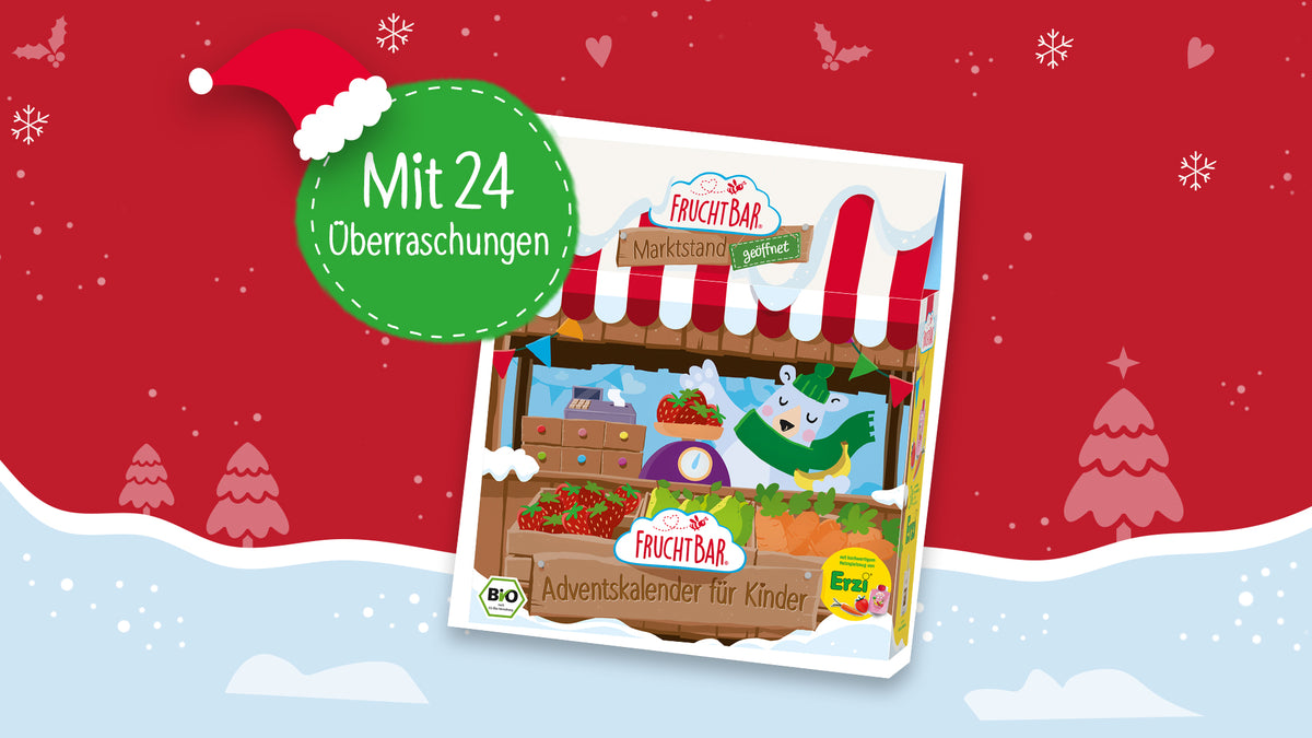 FruchtBar Adventskalender auf dunkelrotem Hintergrund und Schnee auf dem Boden. Schneeflocken, Tannenbäume und Mistelzweige sind im Hintergrund. Grüne Bubble mit Text: Mit 24 Überraschungen.